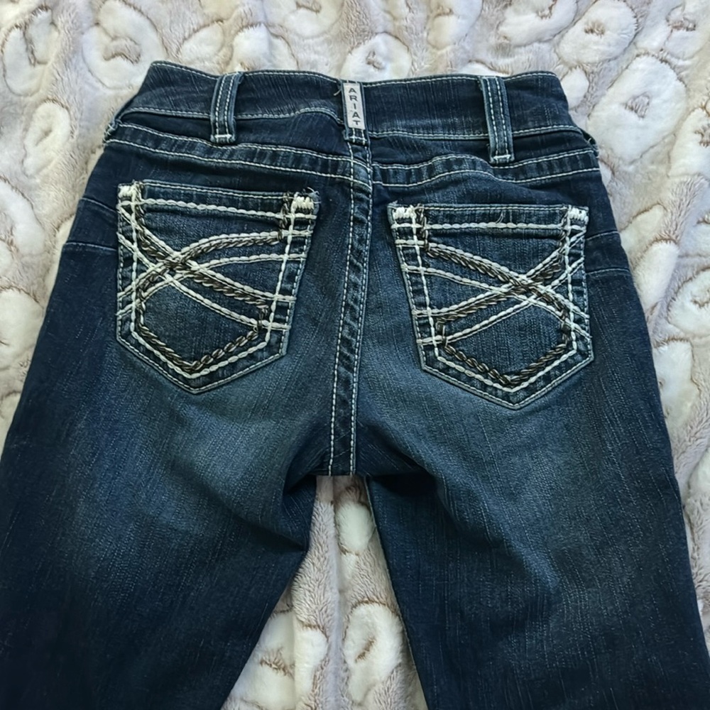 REAL Ariat mid rise boot cut jeans. Worn only a few times.